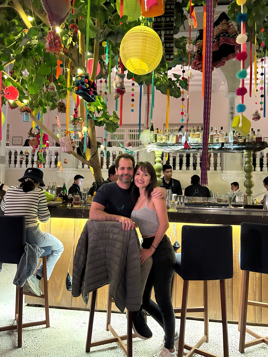 Your hosts — the architect and her partner — at a festive Lima restaurant