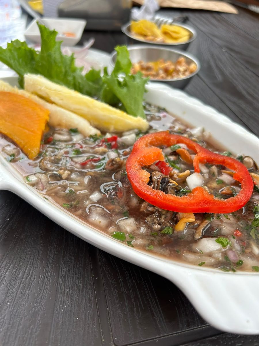 Ceviche de conchas negras with sweet potato, choclo and rocoto